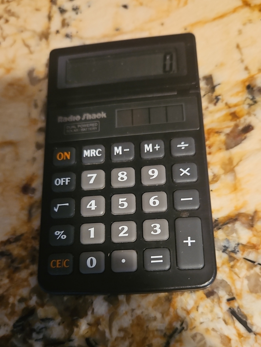 Radio Shack #EC-431 dual power solar/battery calculator.
